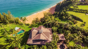 View from above Secret Beach House Kauai with Kauapea Beach in the background