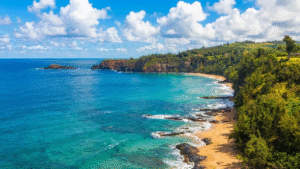Kauapea Beach aka Secret Beach shoreline during summer season
